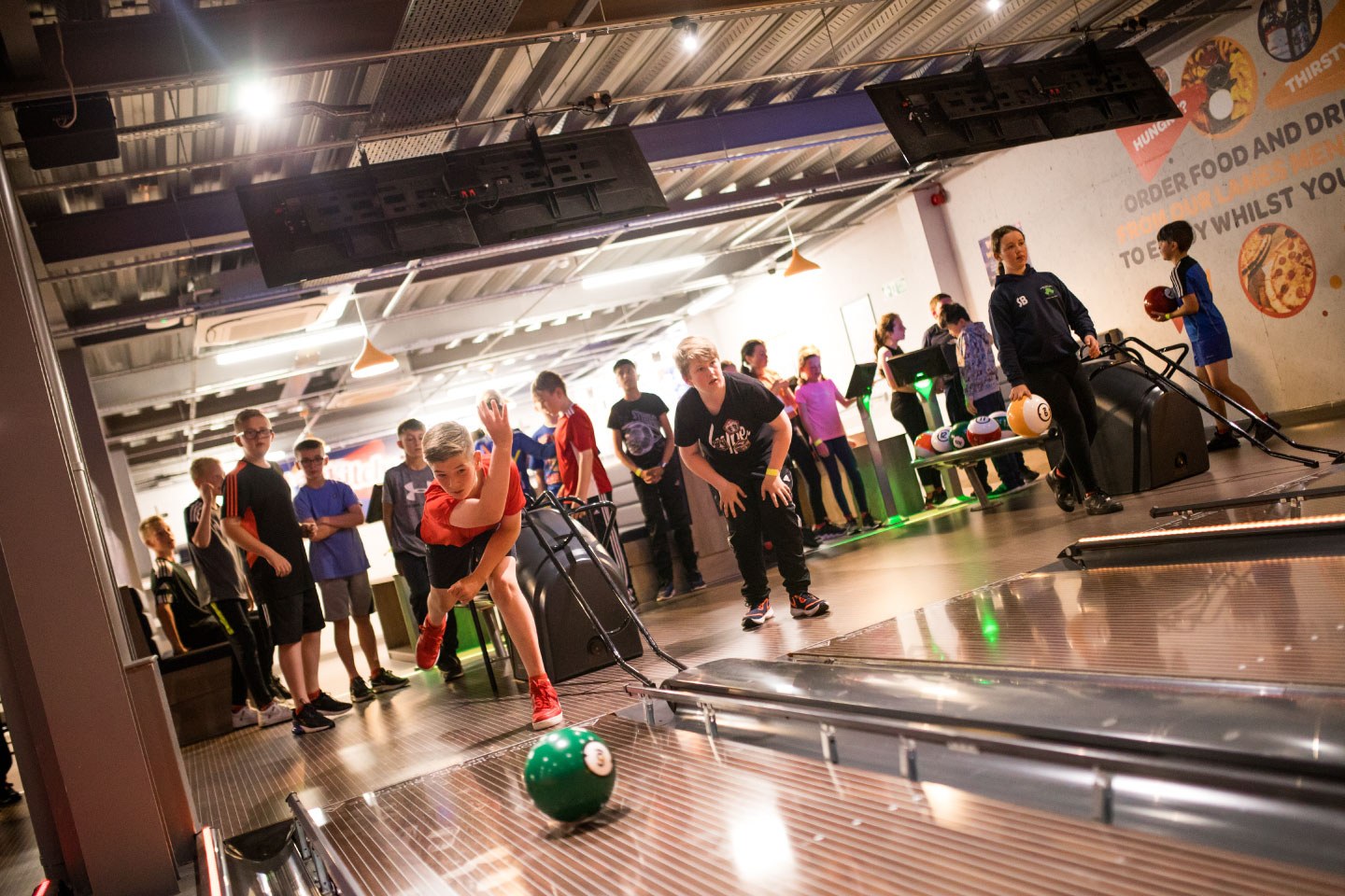 Group of Friends Enjoying 10 Pin Bowling at Airtastic Belfast