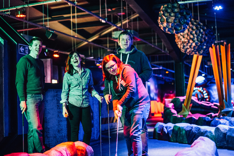 Adults playing Mini Golf at Airtastic Craigavon