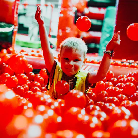 Boy Playing in Ball Pit At Airtastic